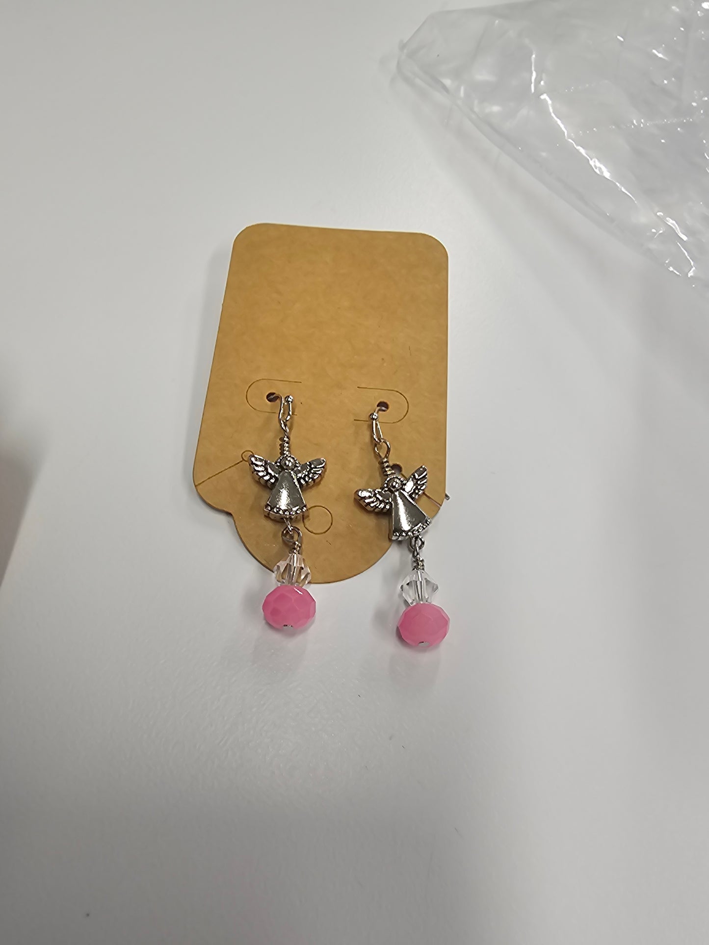 Light pink angel earrings